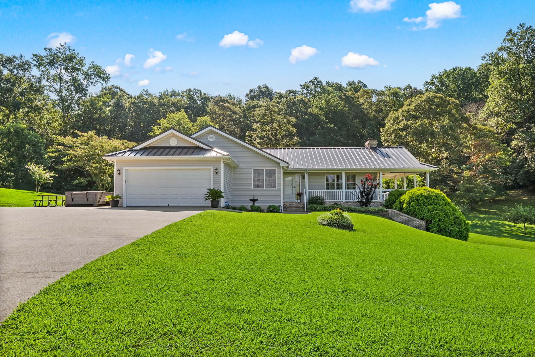 202 Partridge Point Cadiz, KY 42211 - Photo 2 of 100 a front view of a house with yard and green space