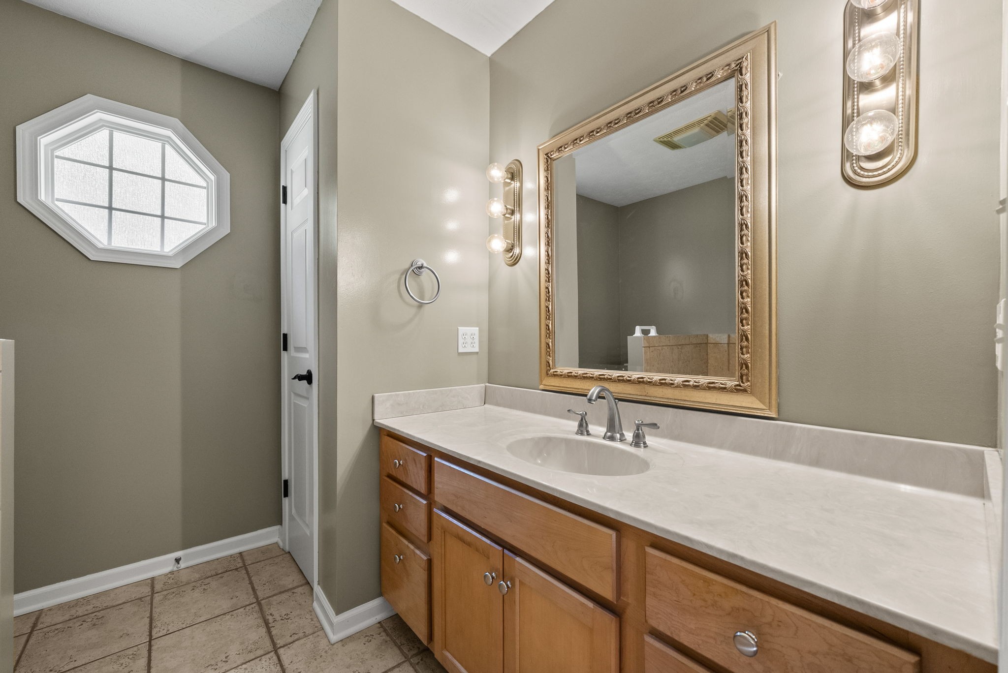 202 Partridge Point Cadiz, KY 42211 - Photo 24 of 100 a bathroom with a sink a mirror and a vanity