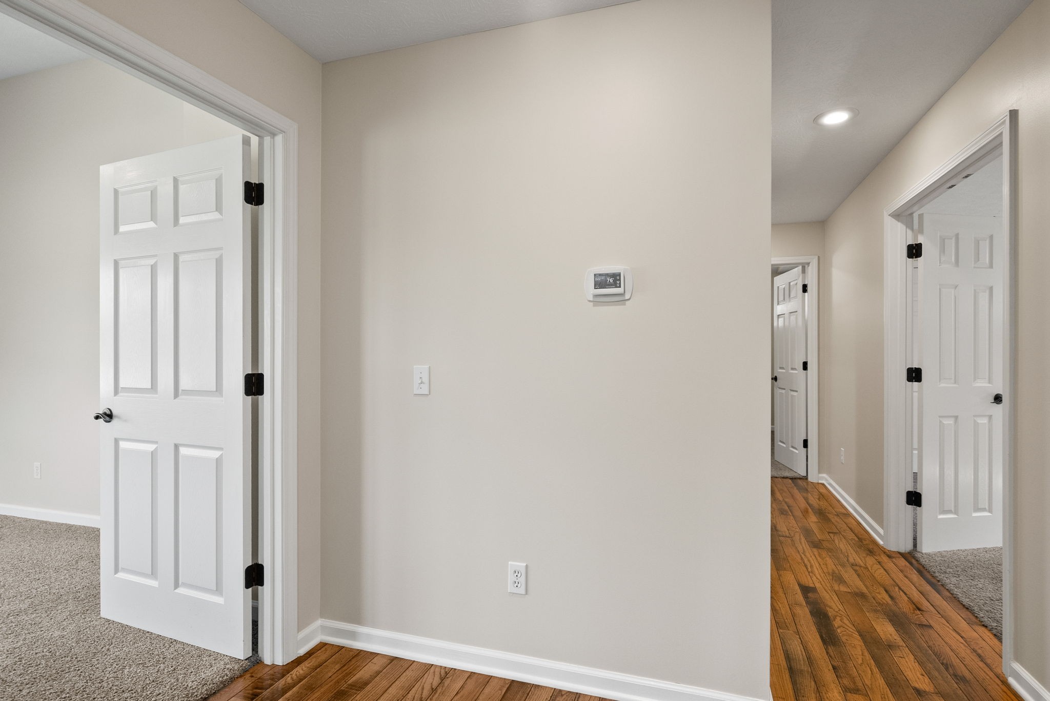202 Partridge Point Cadiz, KY 42211 - Photo 31 of 100 a view of a hallway with wooden floor and staircase