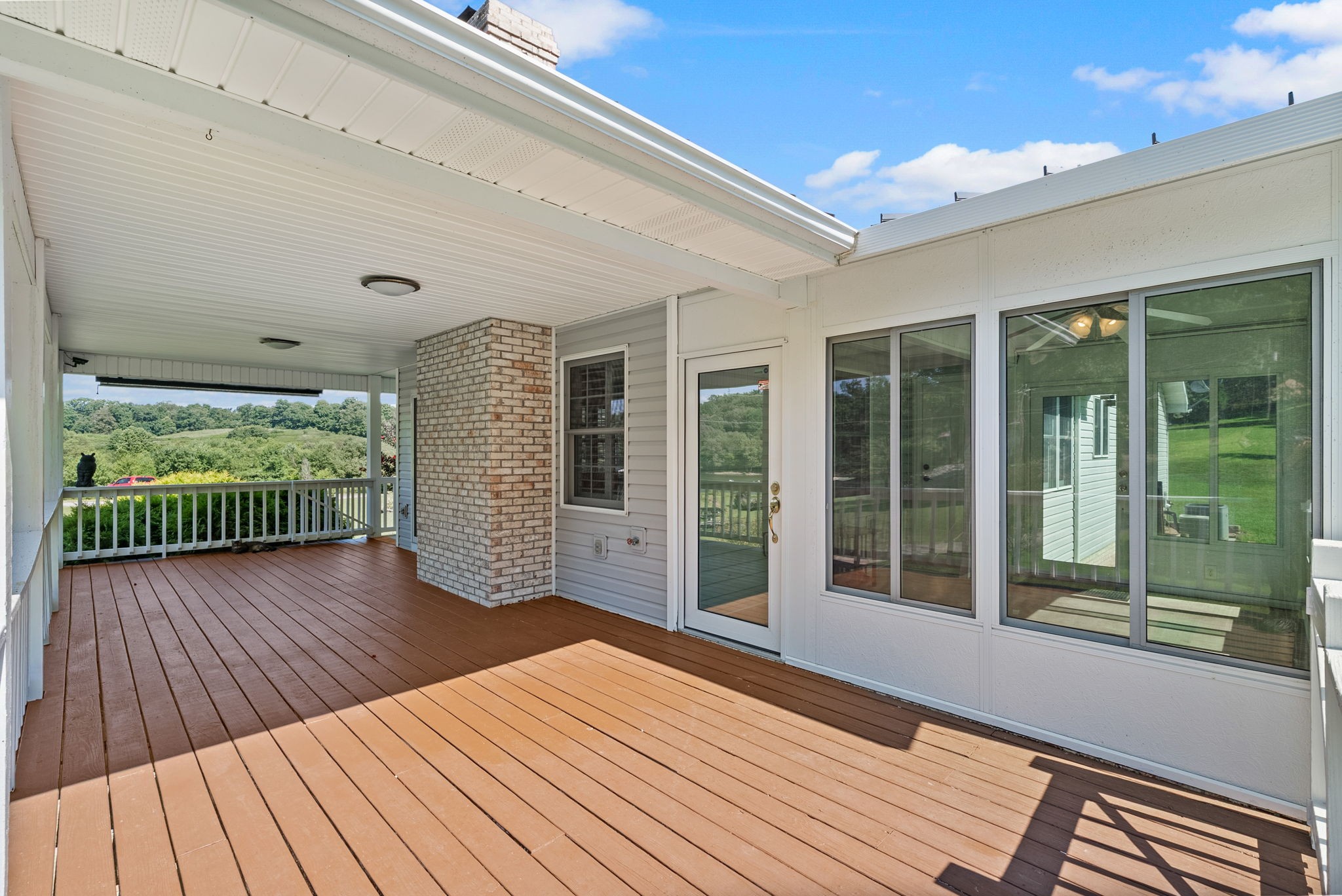 202 Partridge Point Cadiz, KY 42211 - Photo 51 of 100 a view of balcony with floor to ceiling window with wooden floor