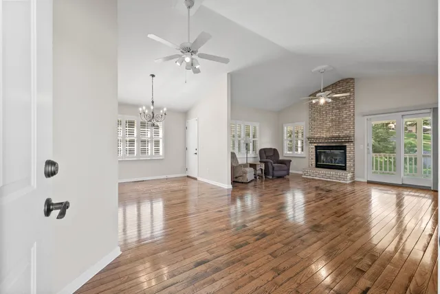 a view of livingroom with hardwood floor and ceiling fan