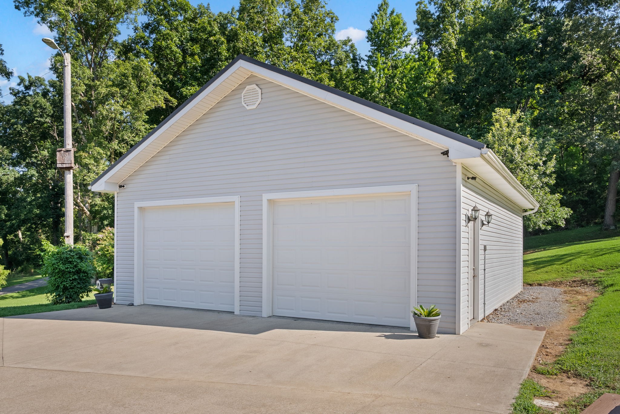 202 Partridge Point Cadiz, KY 42211 - Photo 61 of 100 a view of a house with a yard and garage