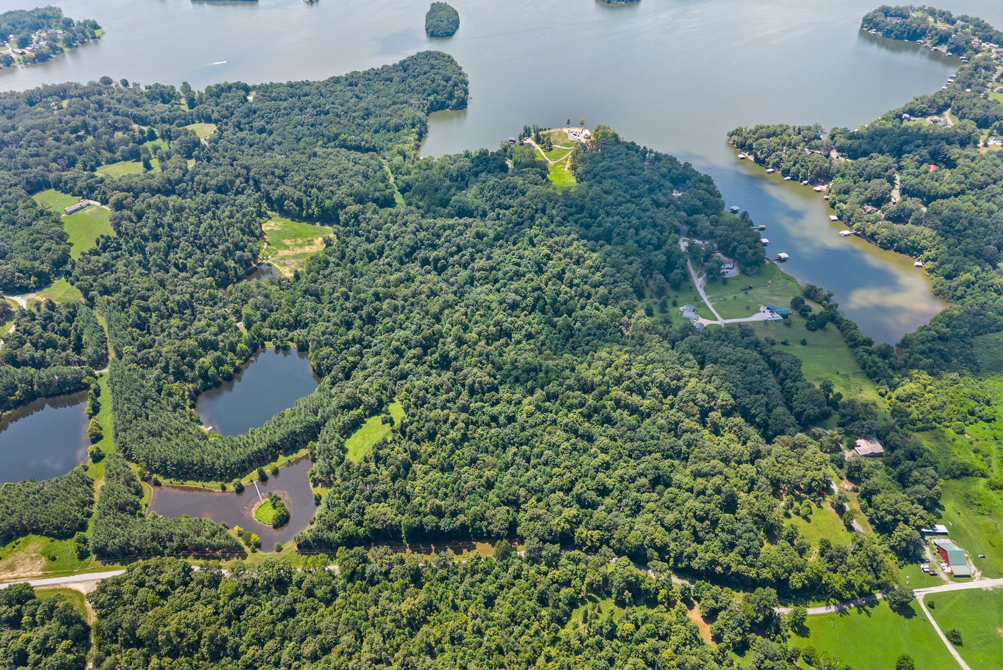 202 Partridge Point Cadiz, KY 42211 - Photo 73 of 100 an aerial view of a residential houses with outdoor space and trees all around