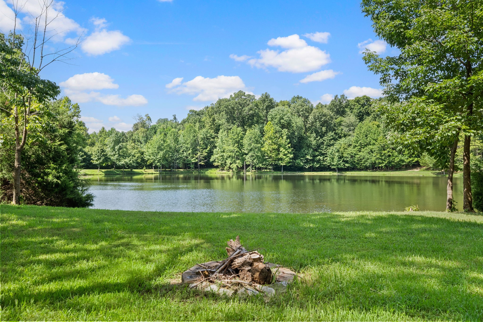 202 Partridge Point Cadiz, KY 42211 - Photo 79 of 100 a lake view with a garden