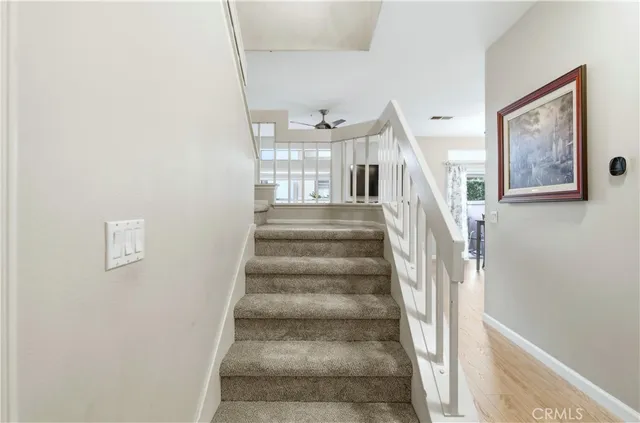 a view of staircase with white walls