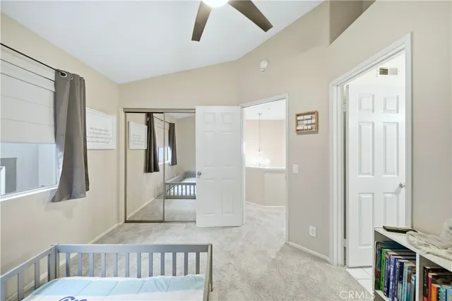 a bedroom with furniture and window