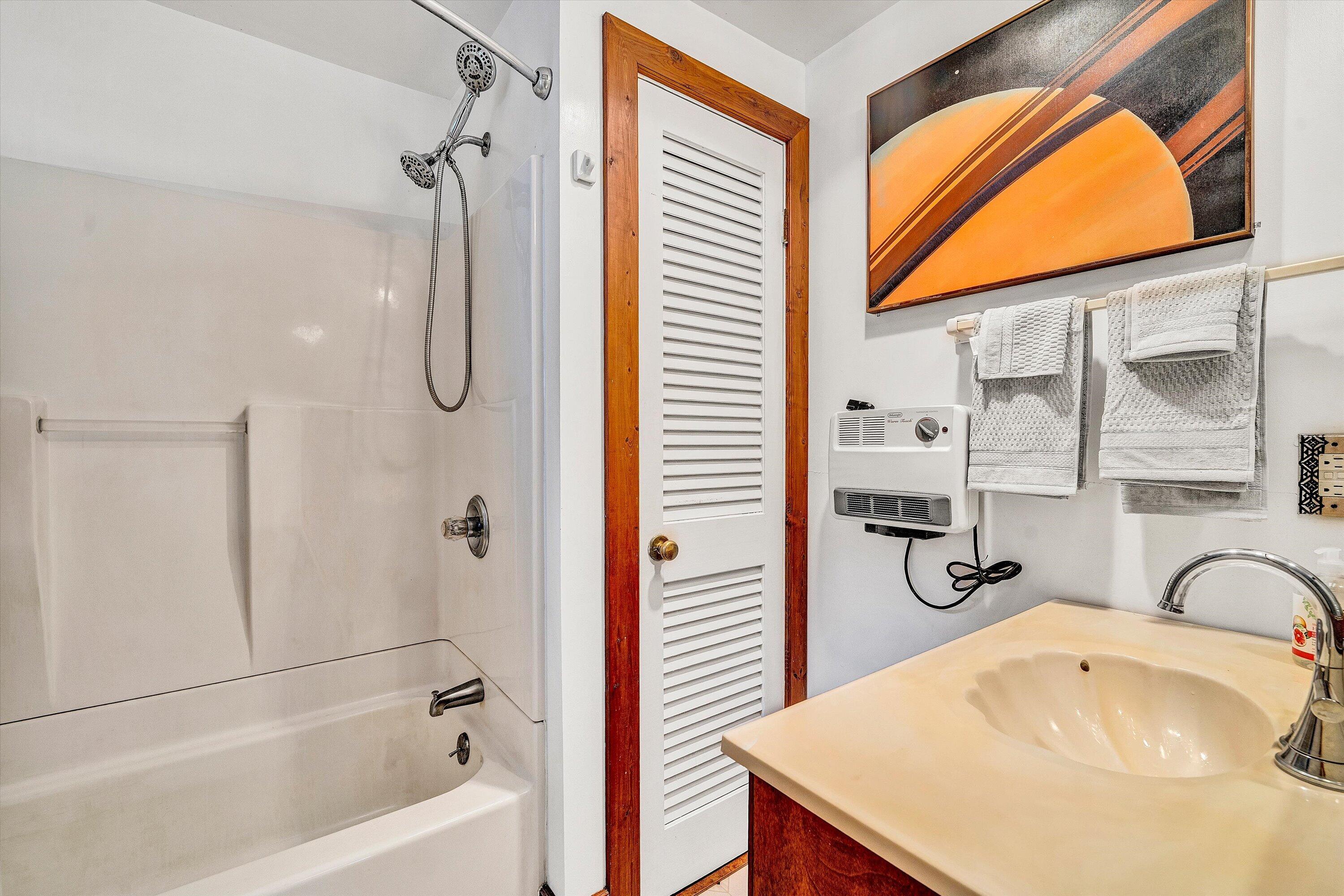 5328 White House Road Moneta, VA 24121 - Photo 11 of 39 a bathroom with a tub sink and mirror
