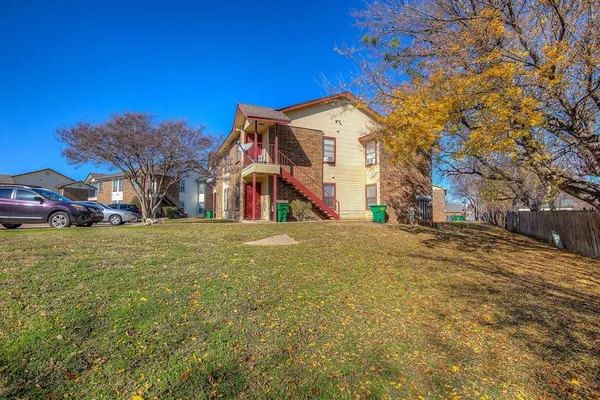 a view of street with parked cars