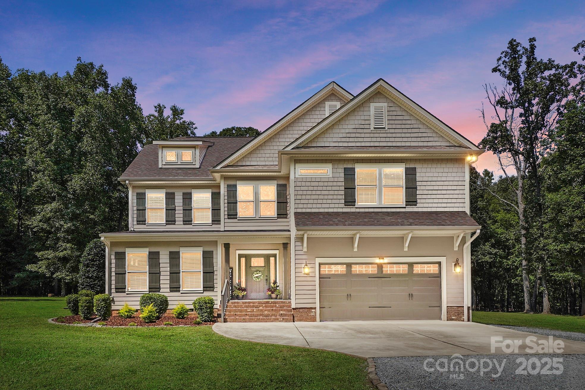 7219 Indian Trail Fairview Road Indian Trail, NC 28079 - Photo 1 of 48 a front view of a house with a yard