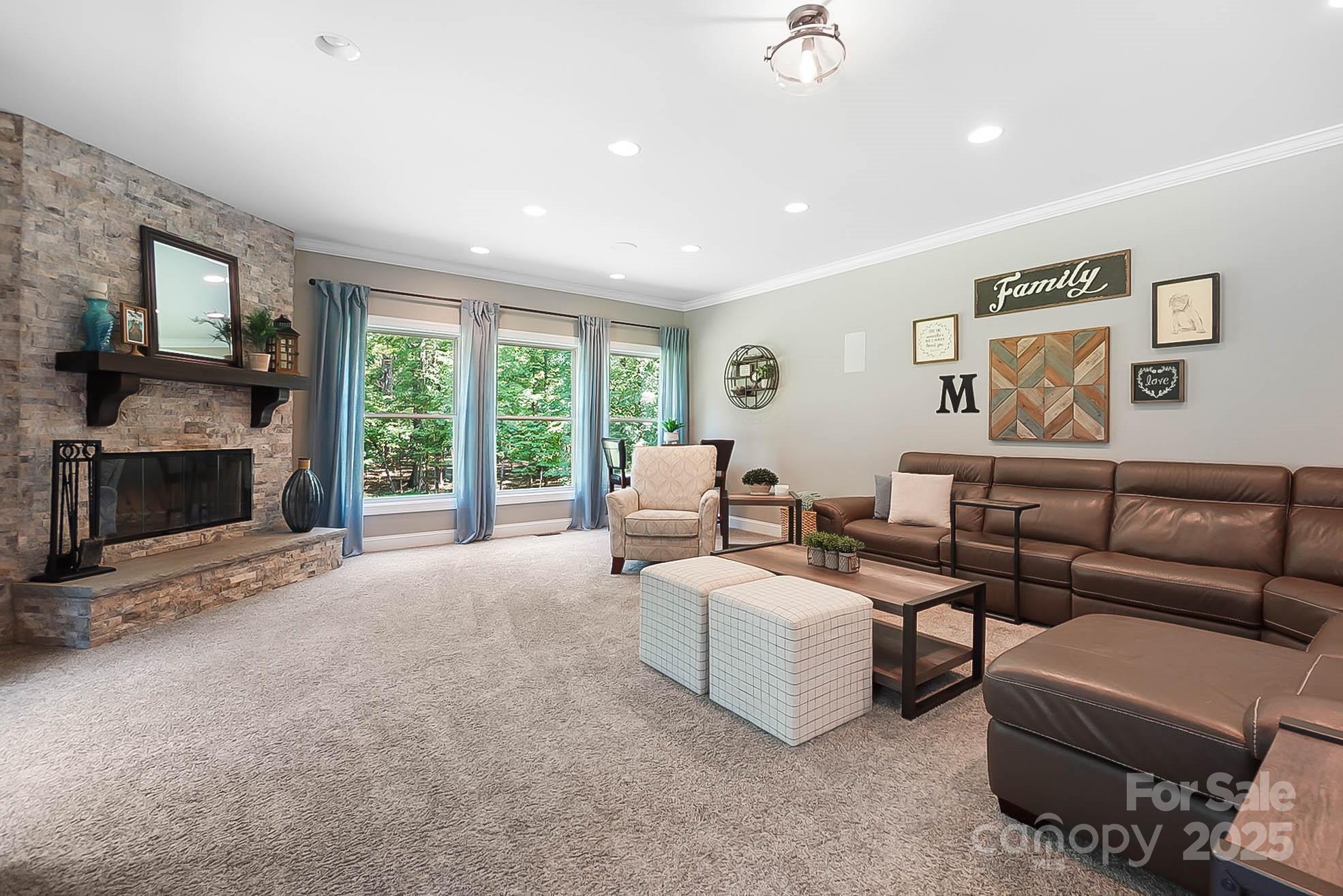 7219 Indian Trail Fairview Road Indian Trail, NC 28079 - Photo 15 of 48 a living room with furniture and a fireplace