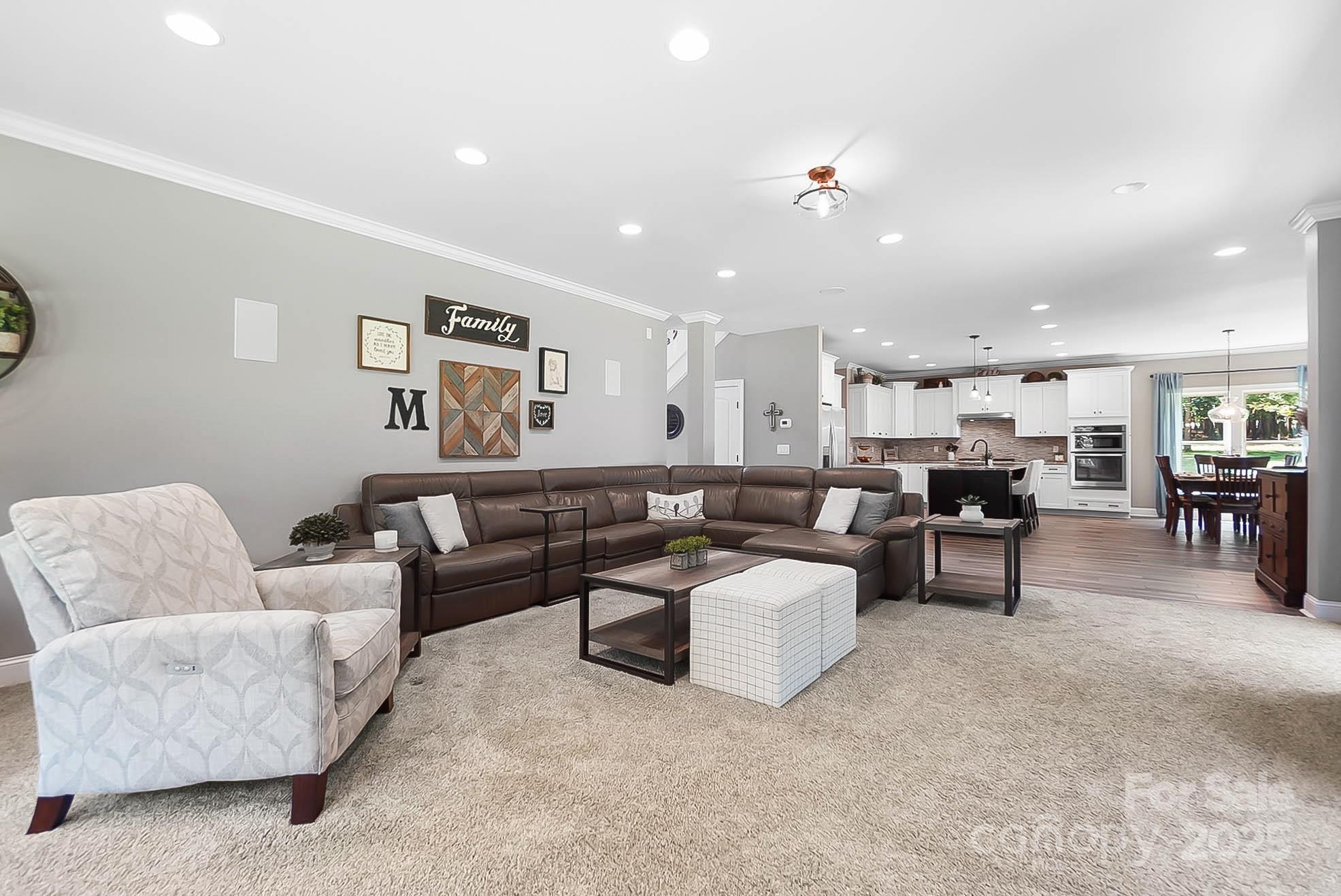 7219 Indian Trail Fairview Road Indian Trail, NC 28079 - Photo 16 of 48 a living room with furniture and view of kitchen