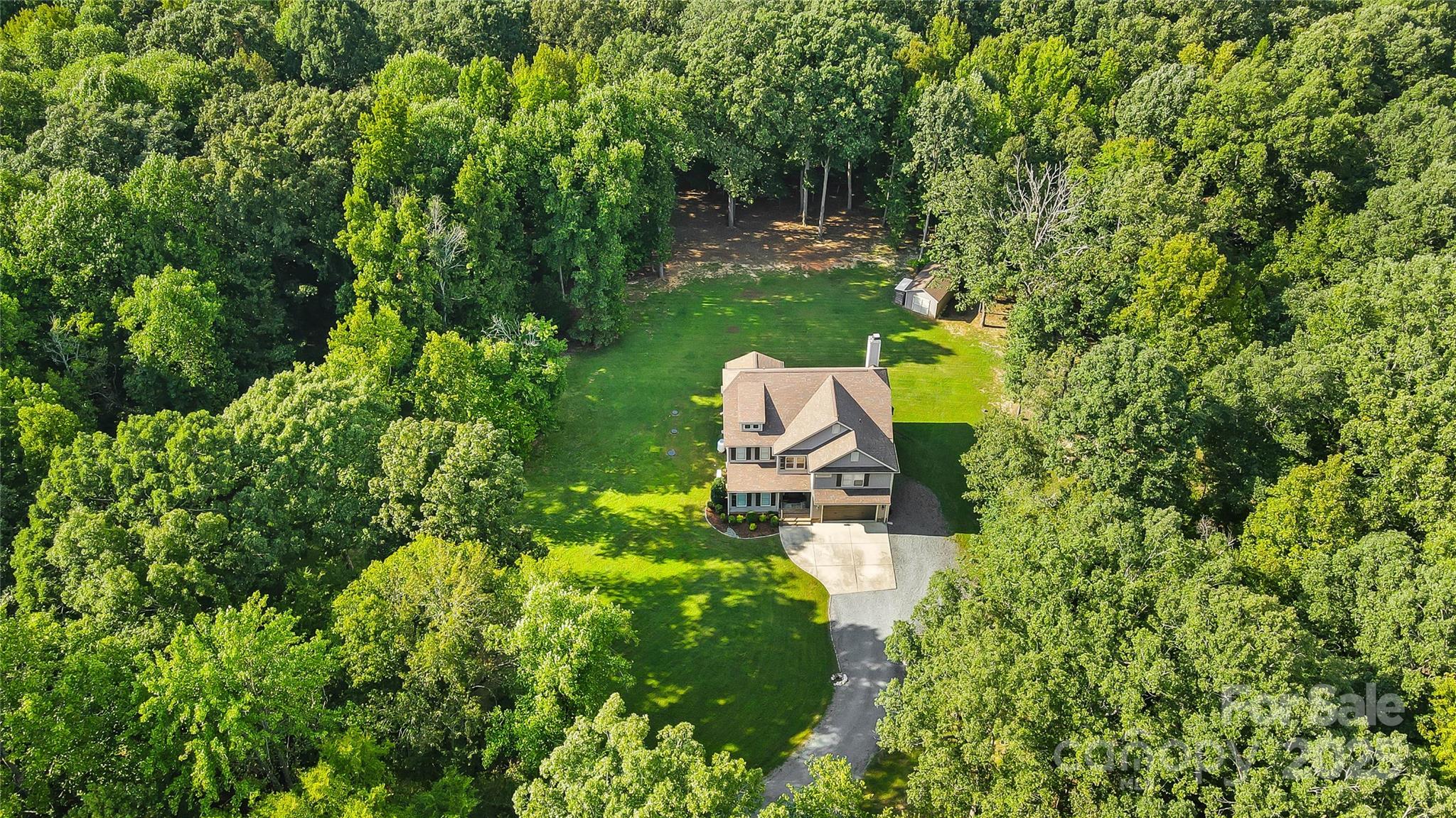 7219 Indian Trail Fairview Road Indian Trail, NC 28079 - Photo 2 of 48 front view of a house with a yard