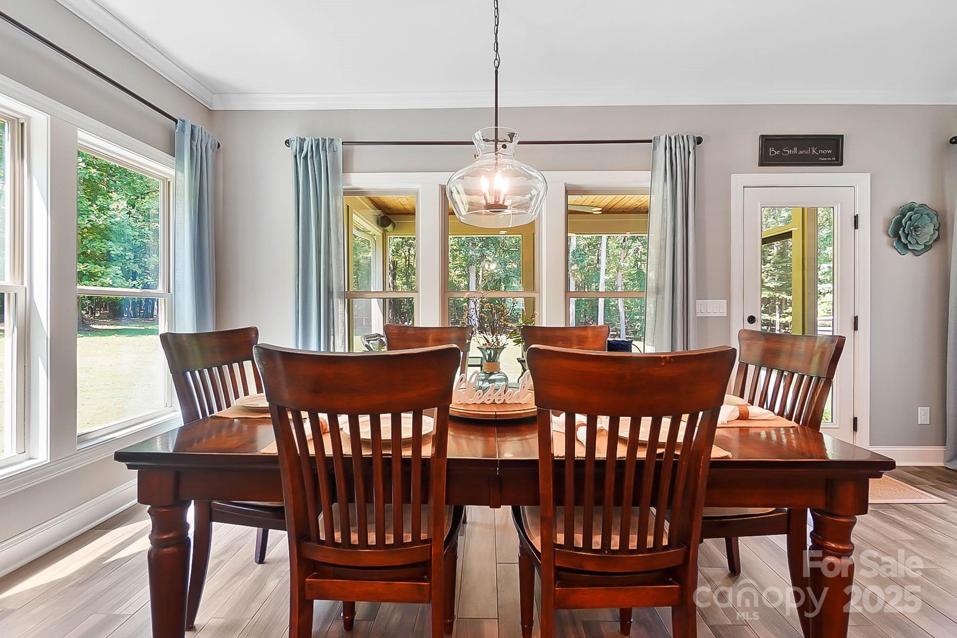 7219 Indian Trail Fairview Road Indian Trail, NC 28079 - Photo 27 of 48 a view of a dining room with furniture window and outside view