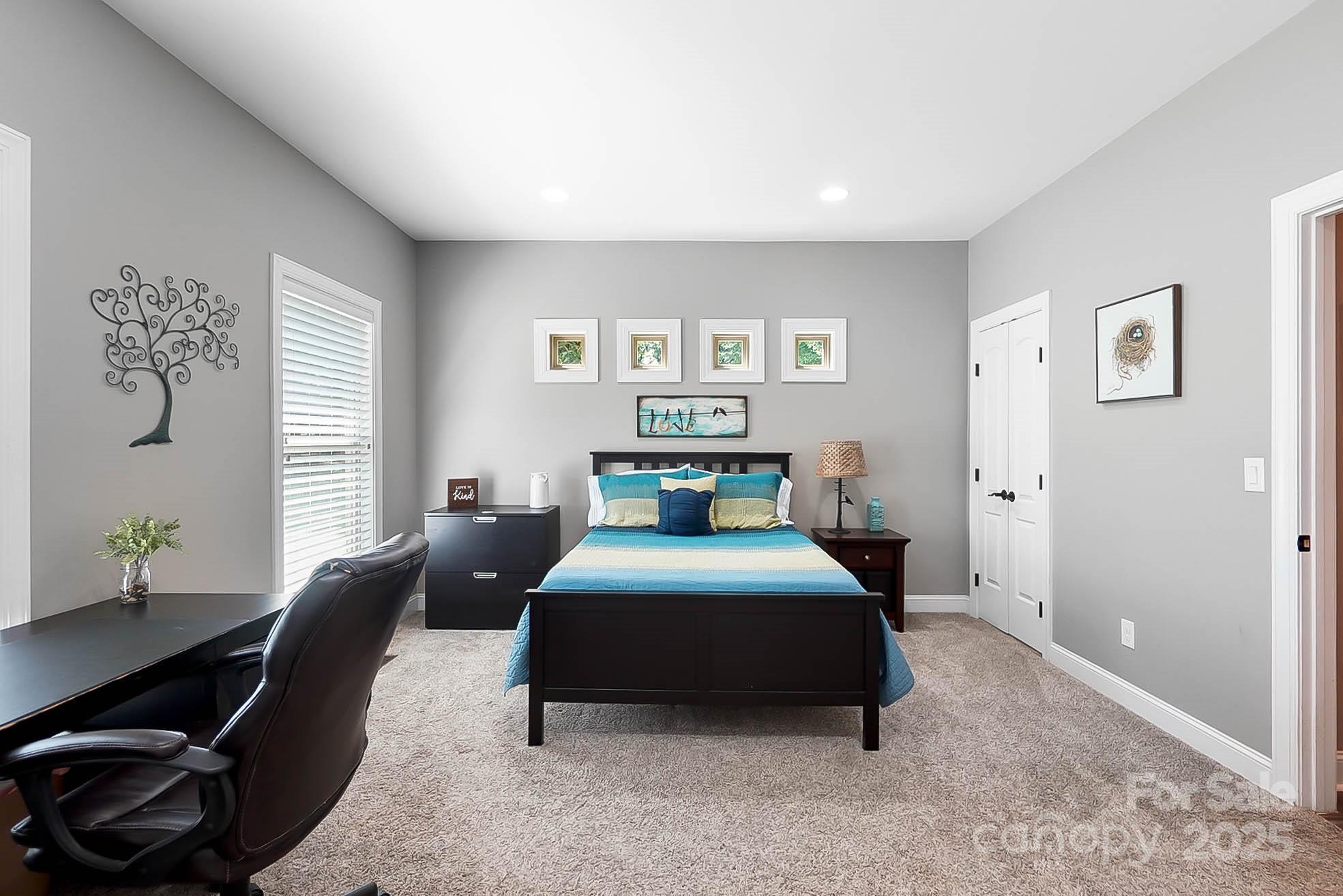 7219 Indian Trail Fairview Road Indian Trail, NC 28079 - Photo 30 of 48 a bedroom with a bed and window
