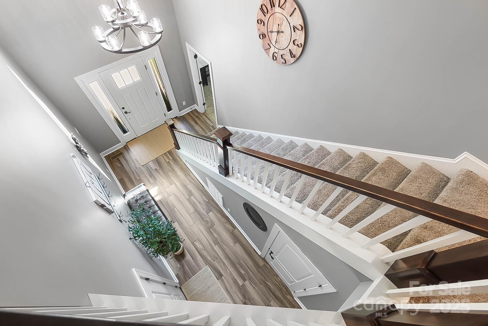7219 Indian Trail Fairview Road Indian Trail, NC 28079 - Photo 31 of 48 a view of staircase with wooden floor
