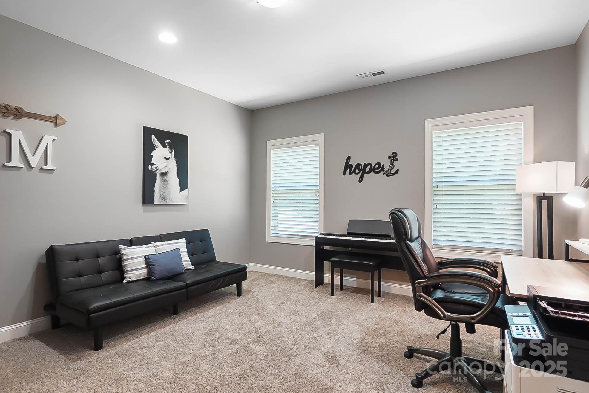 7219 Indian Trail Fairview Road Indian Trail, NC 28079 - Photo 35 of 48 a living room with furniture and a window