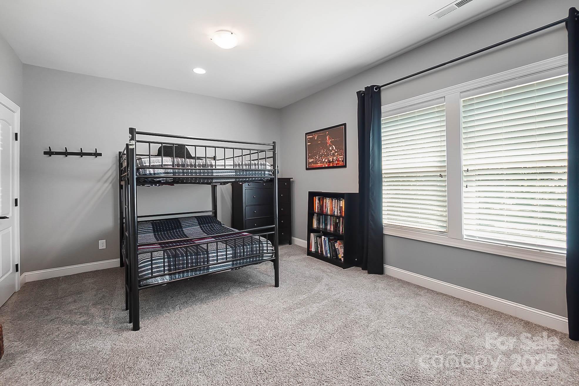 7219 Indian Trail Fairview Road Indian Trail, NC 28079 - Photo 39 of 48 a bedroom with furniture and a window