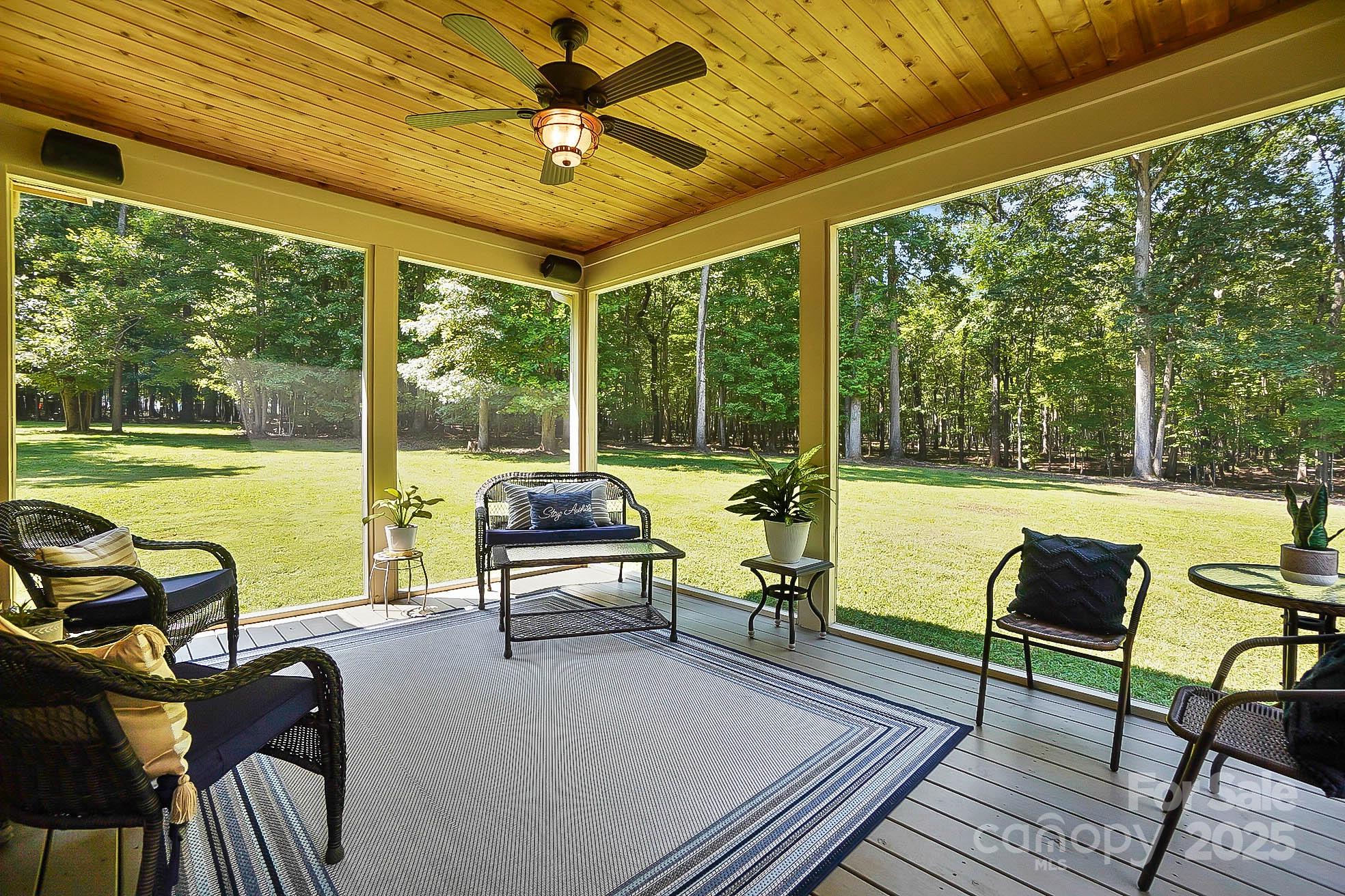 7219 Indian Trail Fairview Road Indian Trail, NC 28079 - Photo 42 of 48 a living room with furniture and a floor to ceiling window