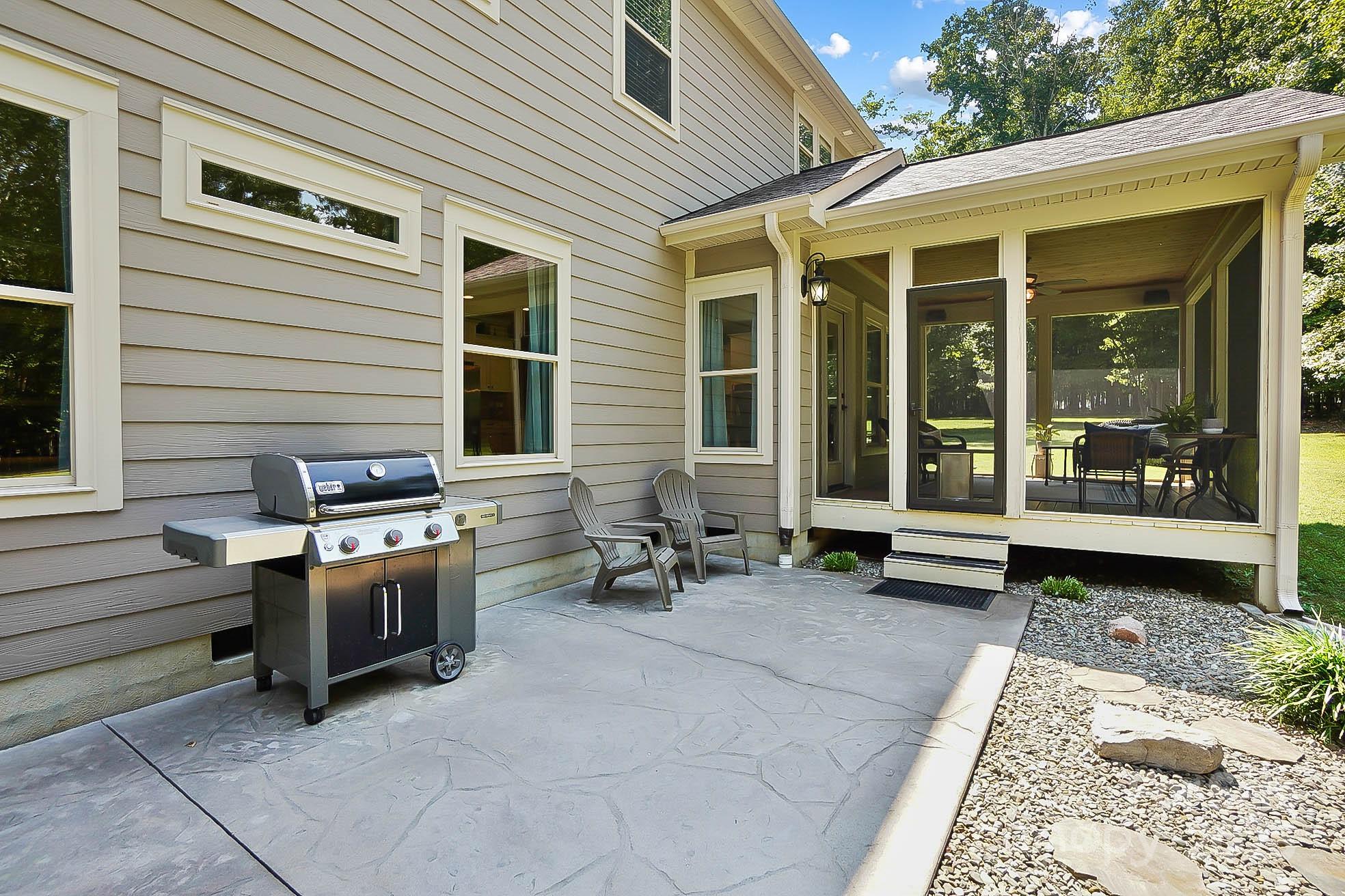 7219 Indian Trail Fairview Road Indian Trail, NC 28079 - Photo 45 of 48 a view of a house with a barbeque