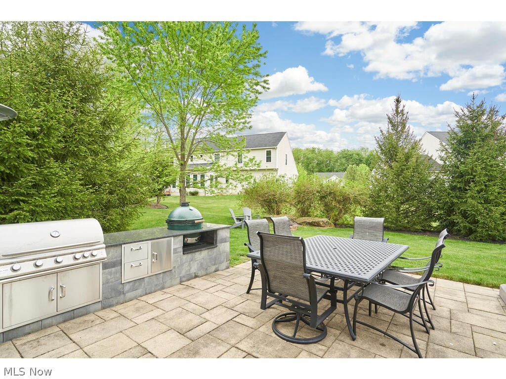 5172 Shillings Way Akron, OH 44321 - Photo 24 of 26 View of terrace featuring a grill and exterior kitchen