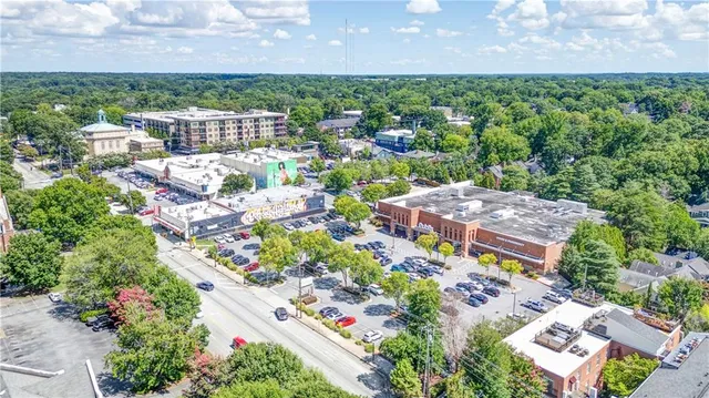 an aerial view of residential houses and outdoor space