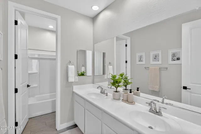 a bedroom with furniture and window