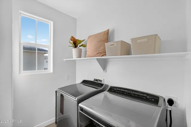a bathroom with a sink toilet and mirror