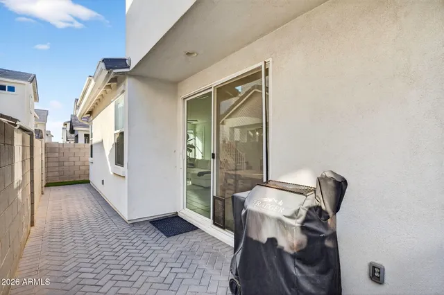 a view of storage and utility room with racks on the wall