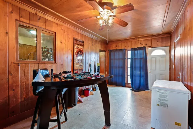 a view of a livingroom with furniture and window