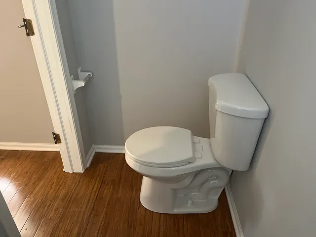 a bathroom with a toilet and a sink