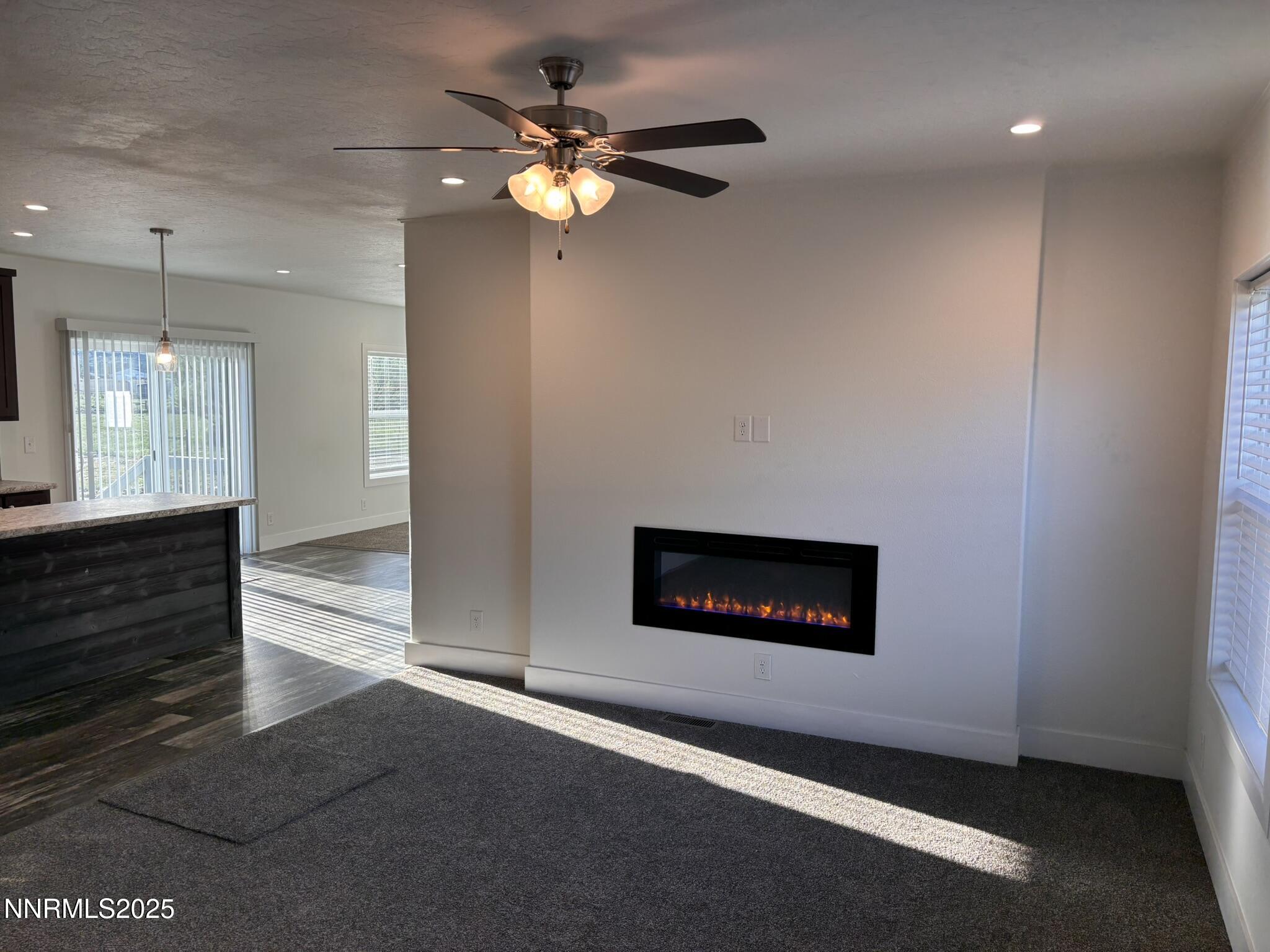 7650 Sylvia Ridge Winnemucca, NV 89445 - Photo 6 of 16 a view of an empty room with a window