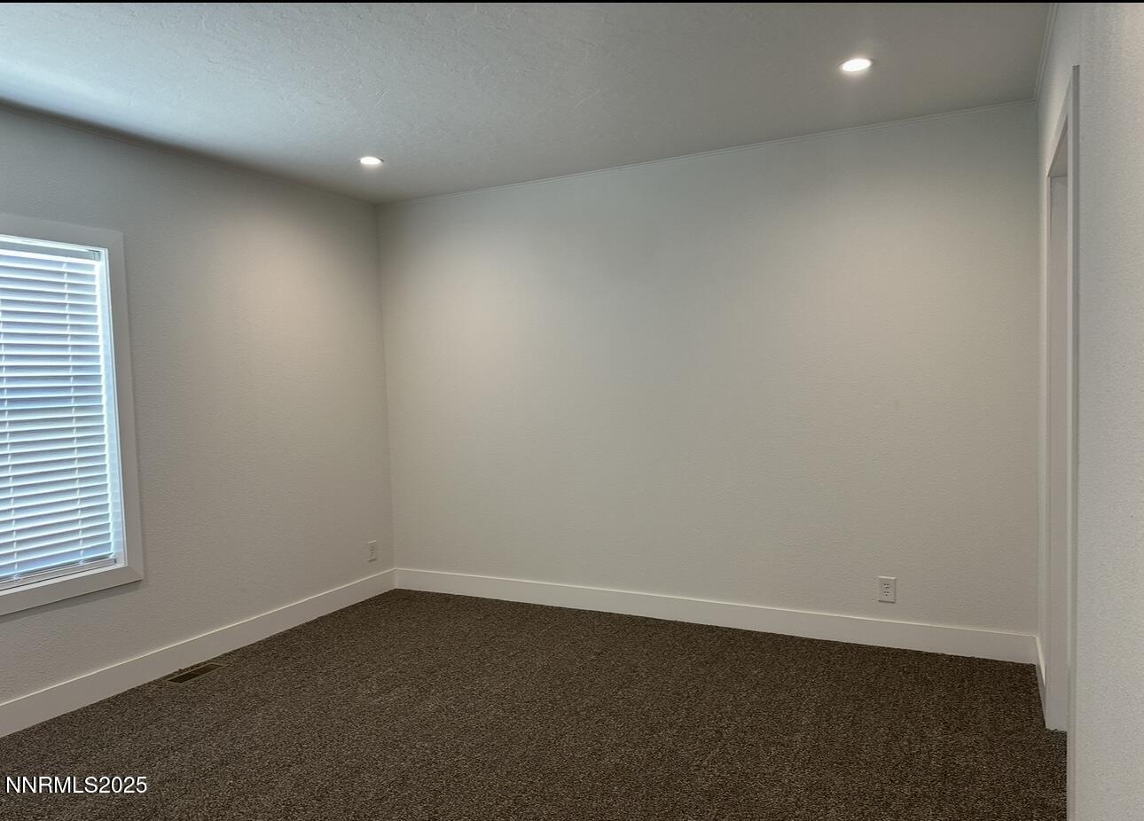 7650 Sylvia Ridge Winnemucca, NV 89445 - Photo 9 of 16 a view of an empty room