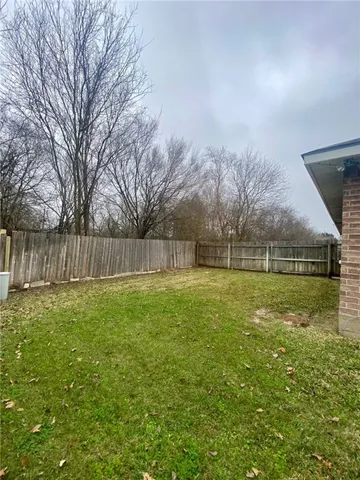 a view of outdoor space with deck and yard