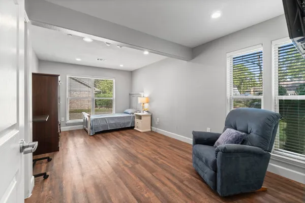 a bathroom with a toilet and a sink