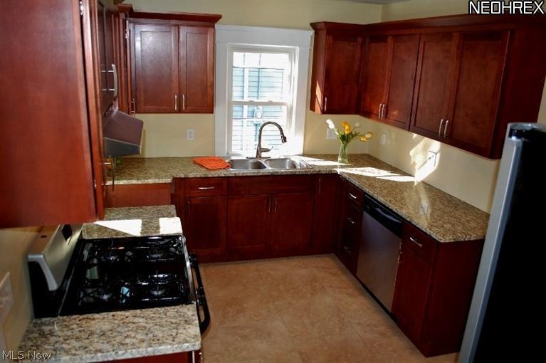 2253 Maplewood Road Cleveland, OH 44118 - Photo 7 of 23 New wood cabinets and granite counters