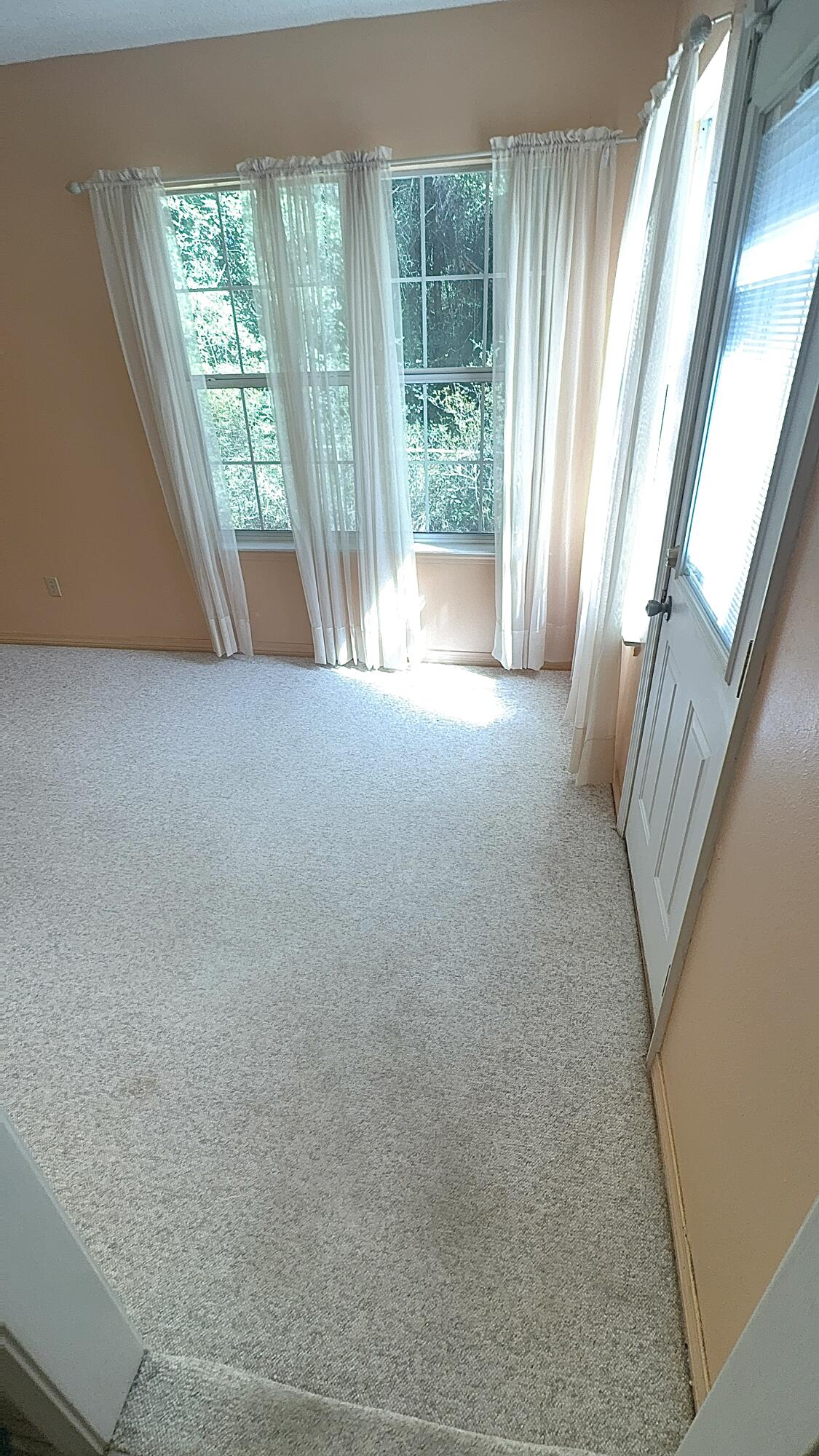 5957 Ridgecrest Road Crestview, FL 32539 - Photo 28 of 56 a view of an empty room with a window
