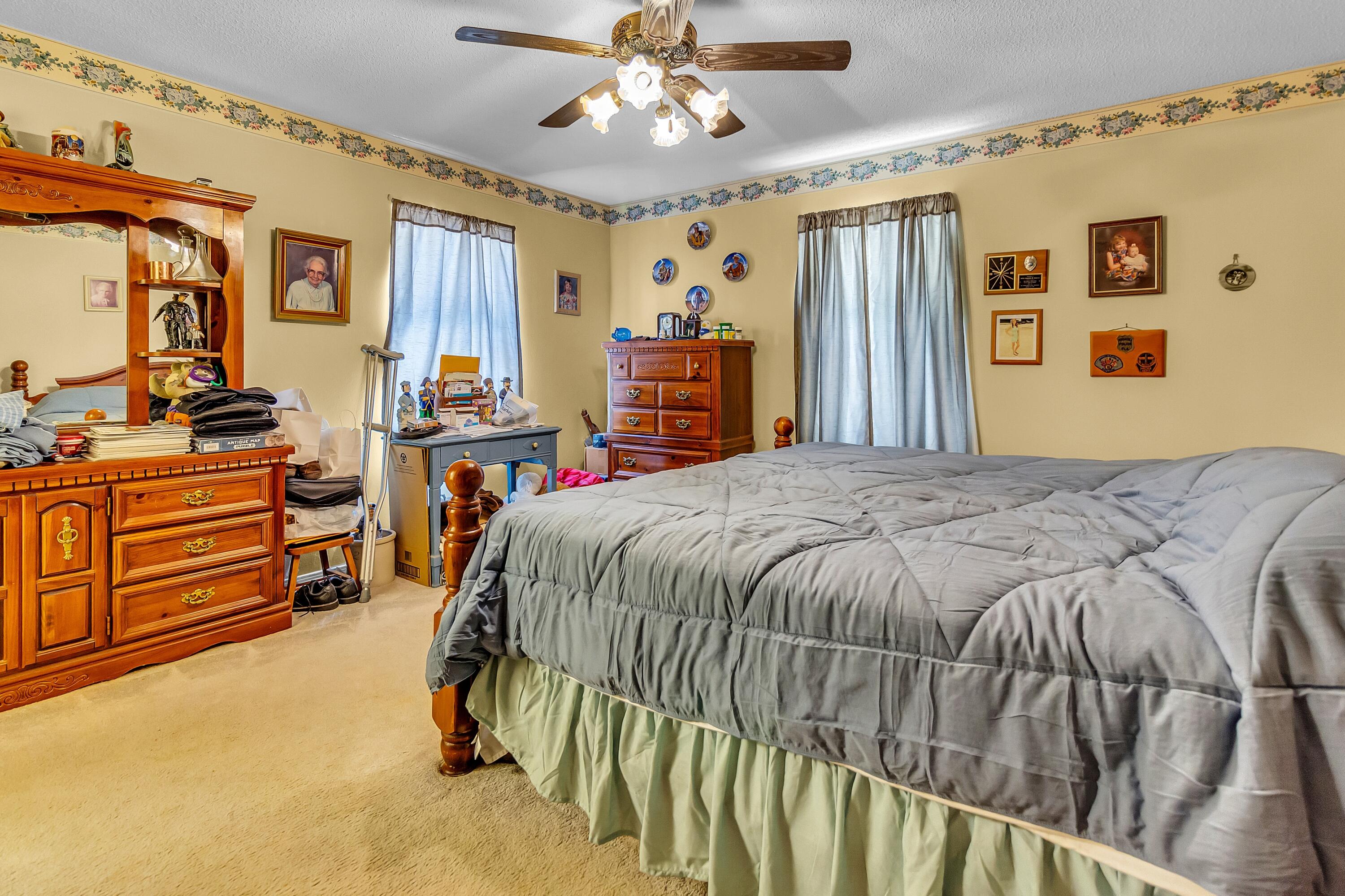 5957 Ridgecrest Road Crestview, FL 32539 - Photo 39 of 56 a bed room with a bed and a tv