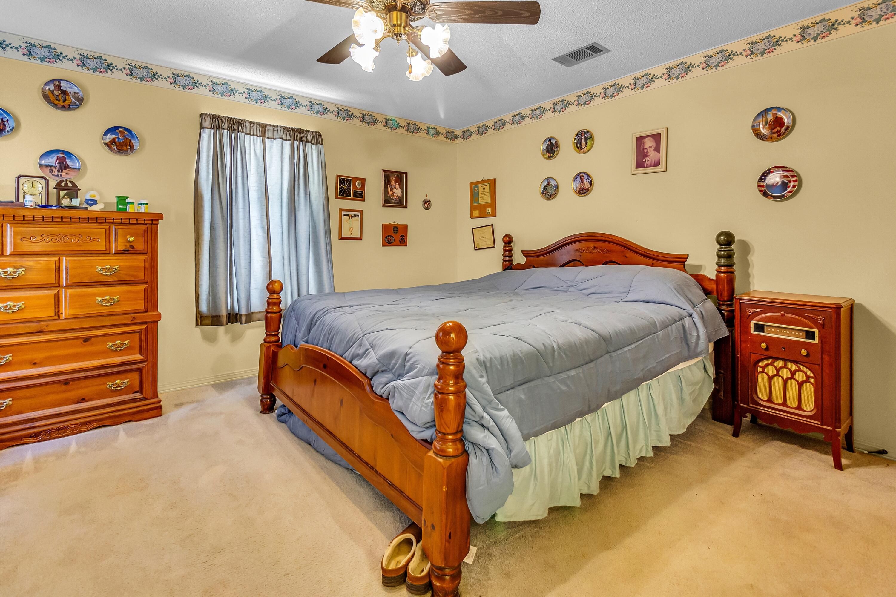 5957 Ridgecrest Road Crestview, FL 32539 - Photo 40 of 56 a bedroom with bed and a window