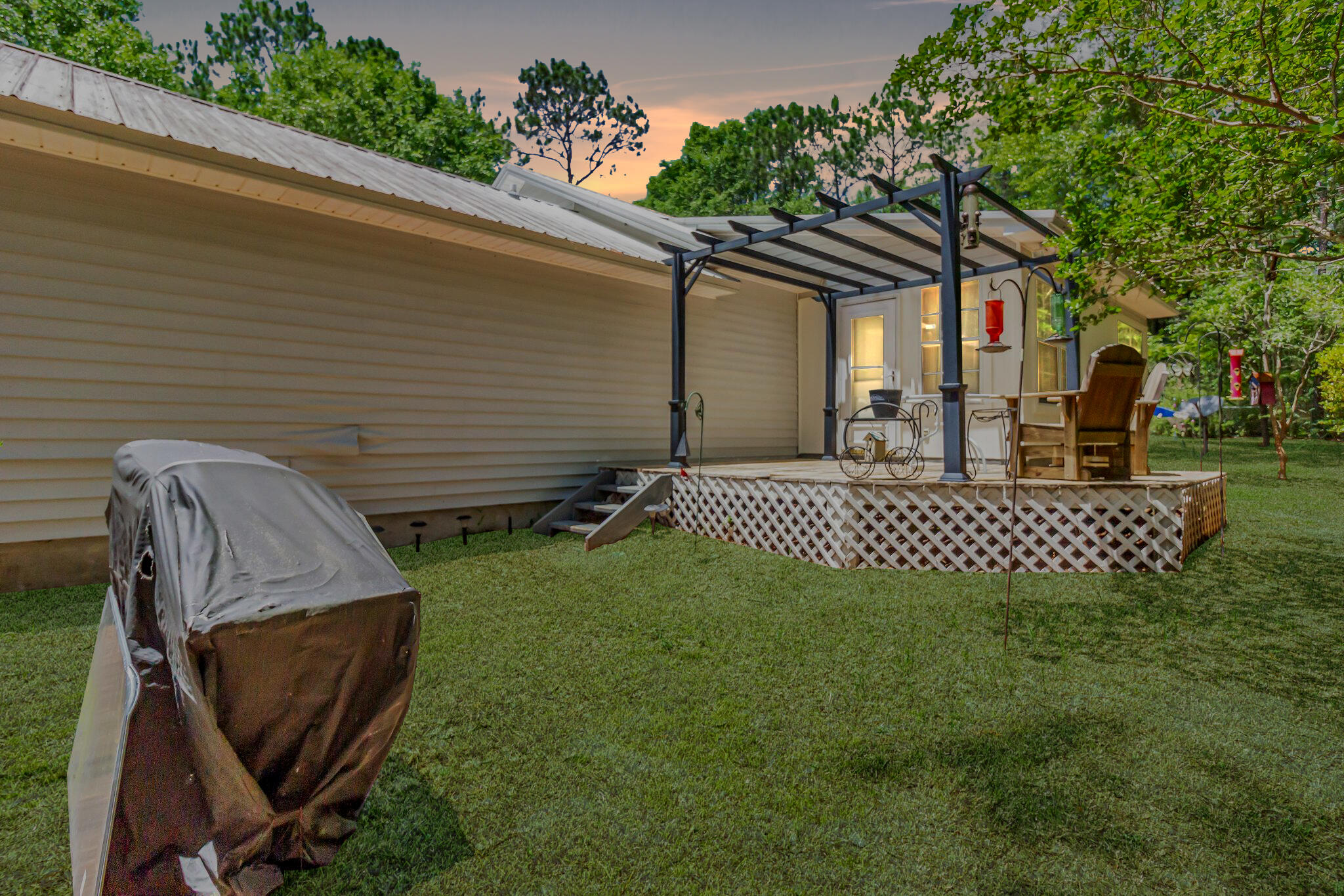 5957 Ridgecrest Road Crestview, FL 32539 - Photo 4 of 56 a view of a back yard of the house