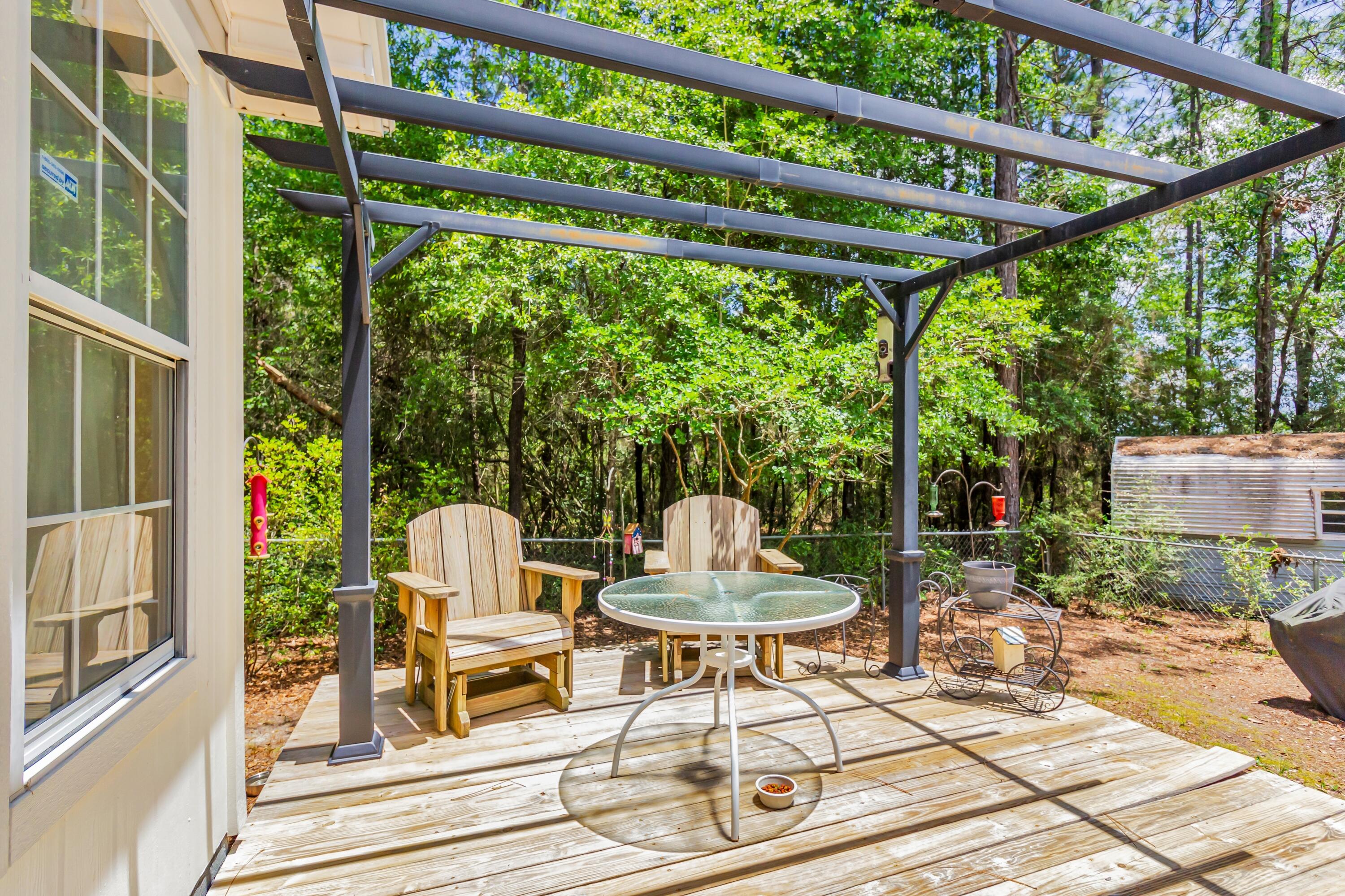 5957 Ridgecrest Road Crestview, FL 32539 - Photo 49 of 56 a patio with yard