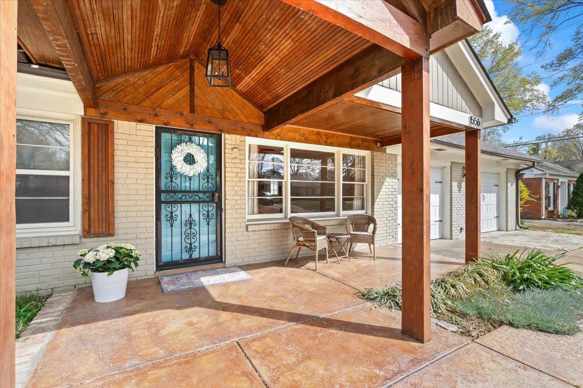 1556 Hayne Road Memphis, TN 38119 - Photo 2 of 27 a house with a outdoor space