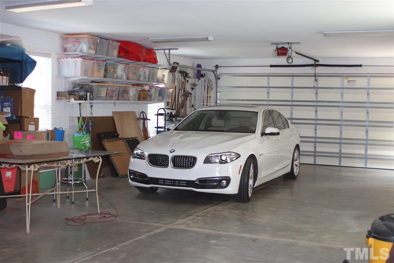 8119 Dreamy Way Raleigh, NC 27613 - Photo 30 of 30 a car parked in a garage
