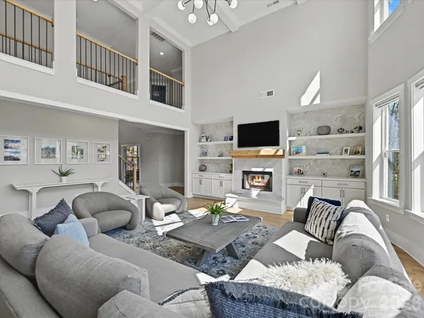 a bathroom with a granite countertop toilet a sink and a bathtub