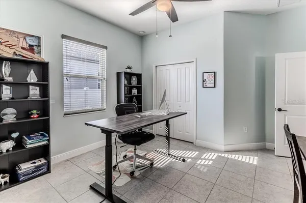 a view of a workspace with furniture