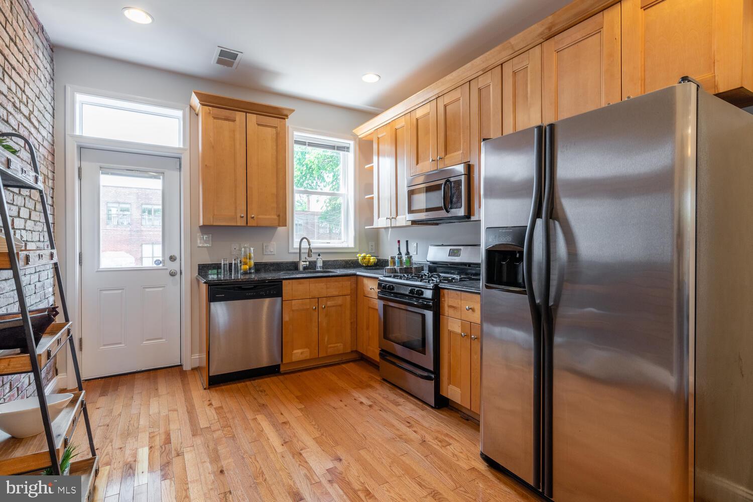 317 K Street Northeast Washington, DC 20002 - Photo 9 of 47 Kitchen with granite and stainless