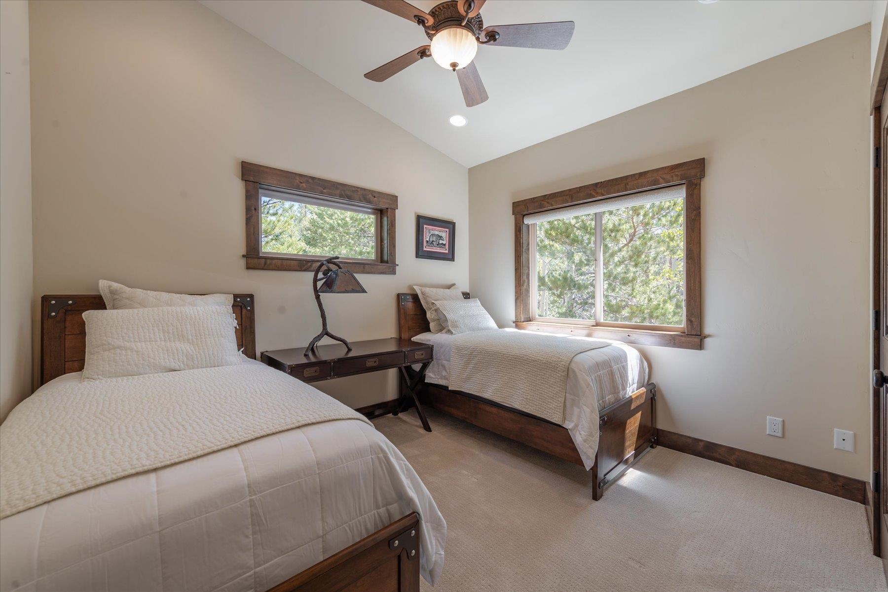 14475 Alder Creek Road Truckee, CA 96161 - Photo 16 of 21 a bed room with two beds and a window