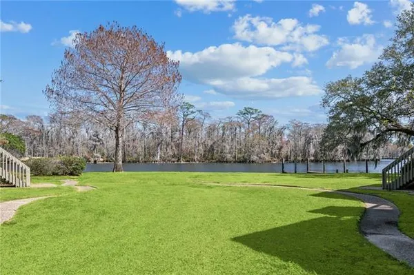 $395,000 | 106 Tchefuncte Oaks Drive, Unit 106, Mandeville, LA 70471
