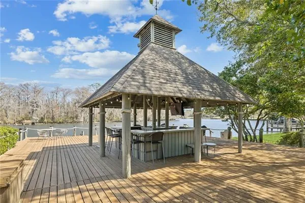 $395,000 | 106 Tchefuncte Oaks Drive, Unit 106, Mandeville, LA 70471