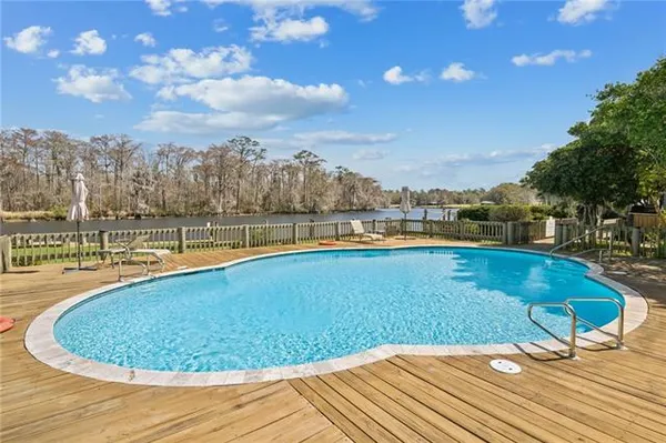 $395,000 | 106 Tchefuncte Oaks Drive, Unit 106, Mandeville, LA 70471