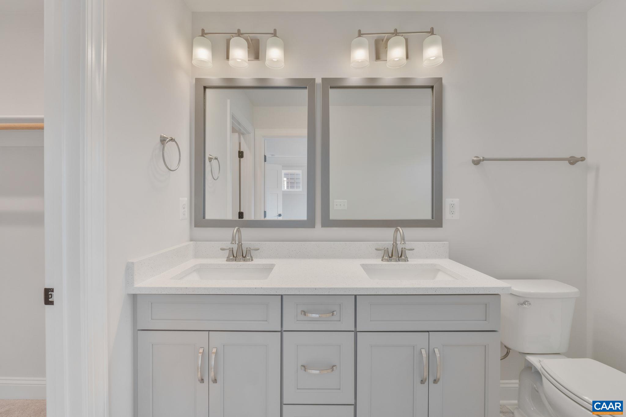 797 Park Ridge Drive Crozet, VA 22932 - Photo 26 of 43 a bathroom with double sink and a mirror